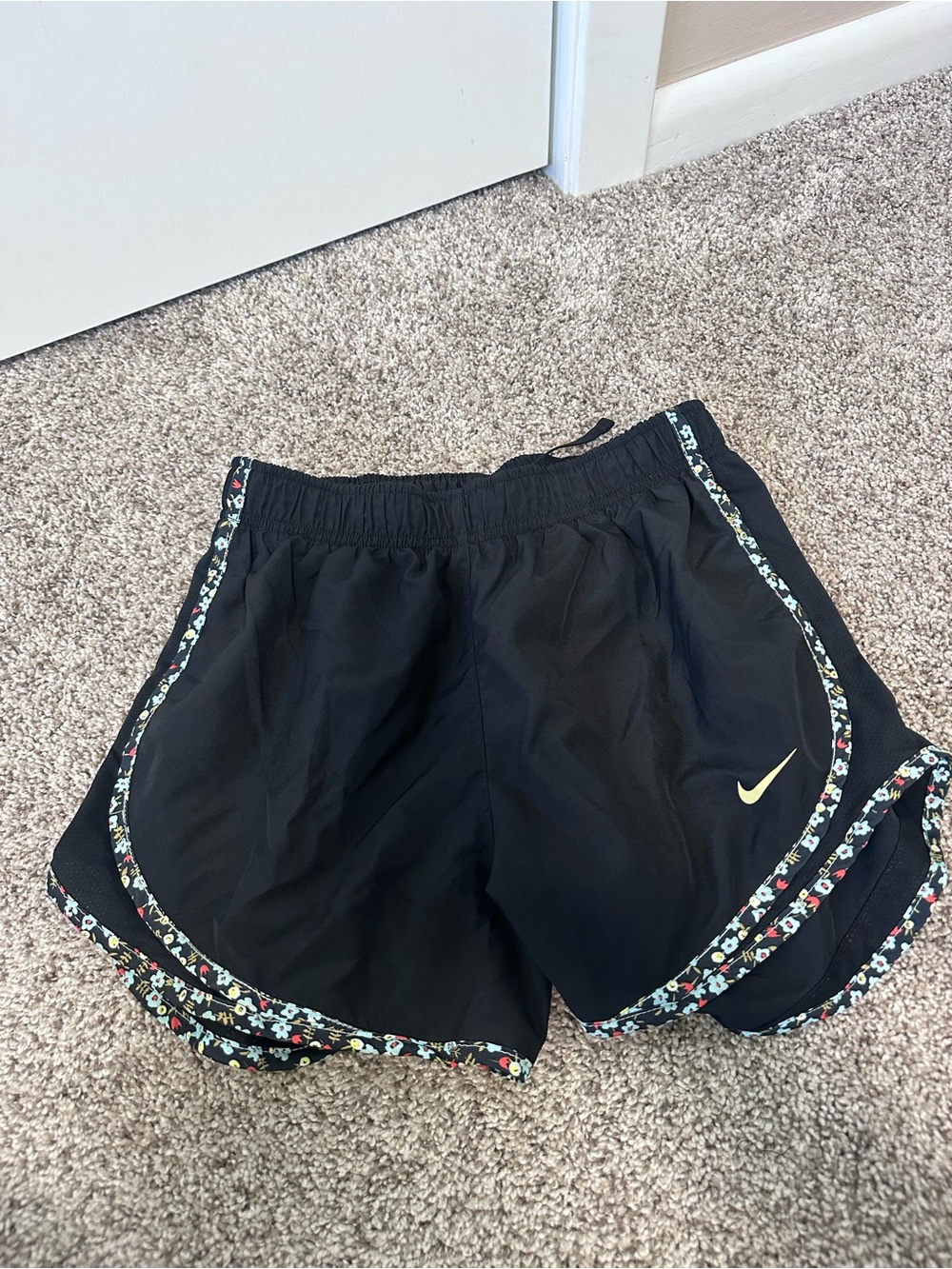 Nike Women's Black Athletic Shorts with Floral Piping